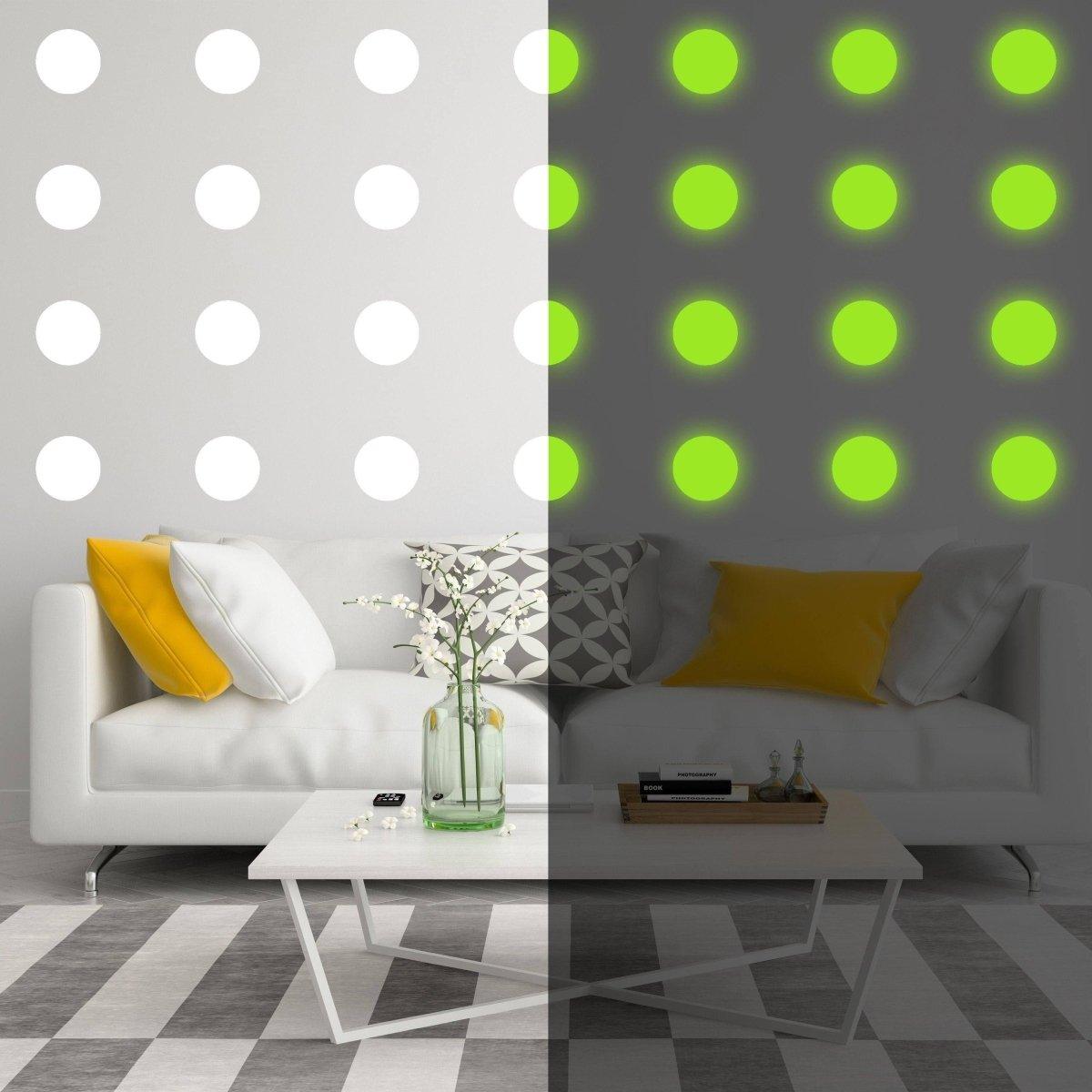 Illuminated wall art with glow in dark dots in a modern living room setting, showcasing transforming decor.