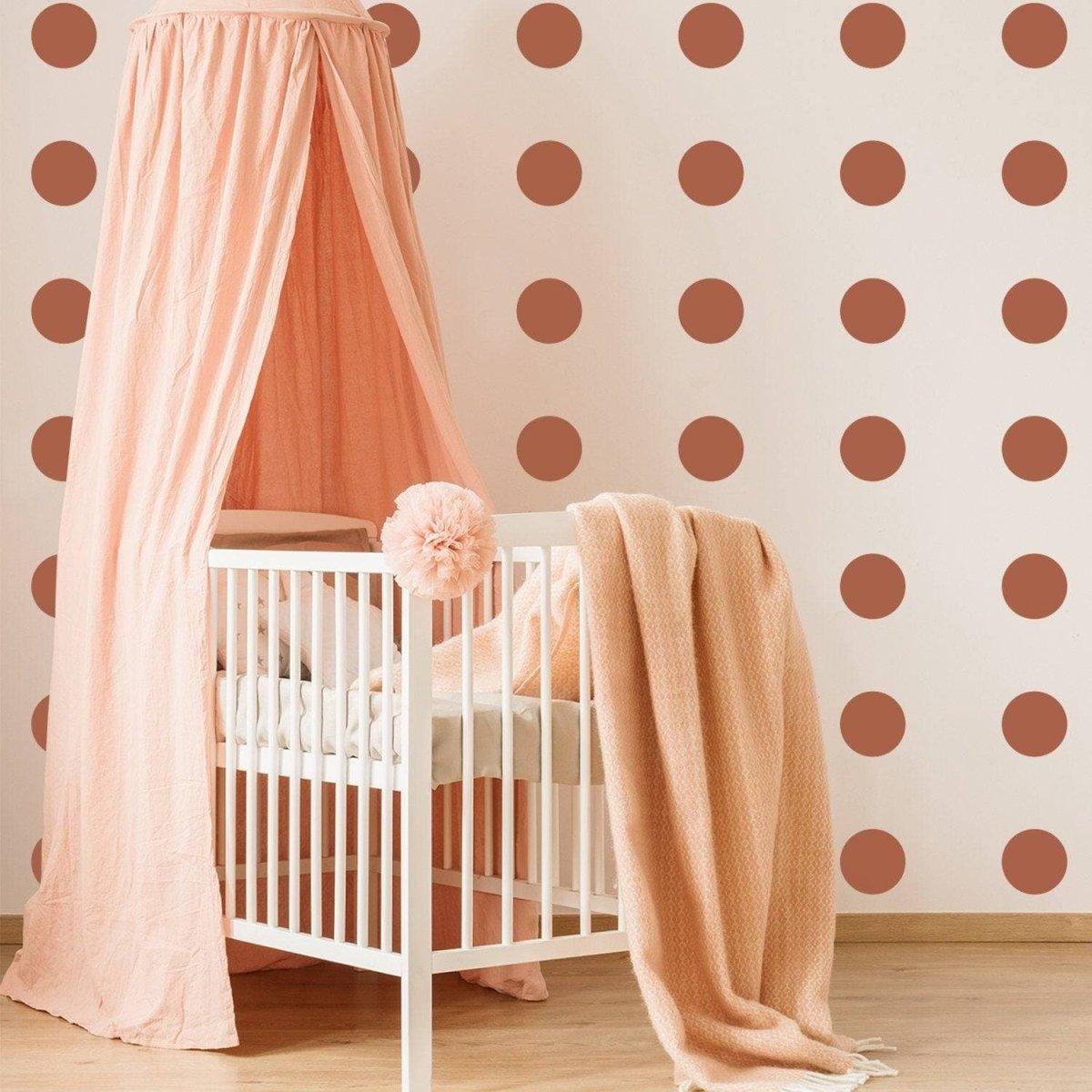 Gold Circle Wall Decals on nursery wall with pink canopy crib, creating a magical and elegant children's room decor.