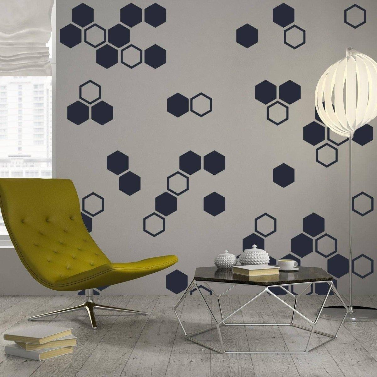 Elegant living room featuring hexagon wall decals in navy blue on a stylish gray wall.