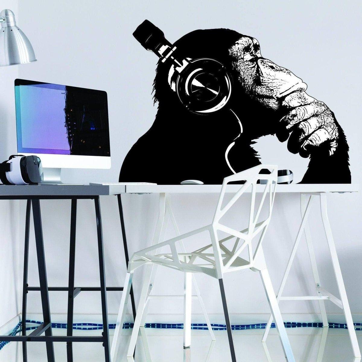 Street art gorilla mural print with headphones, perfect for urban decor and wall art in modern spaces.