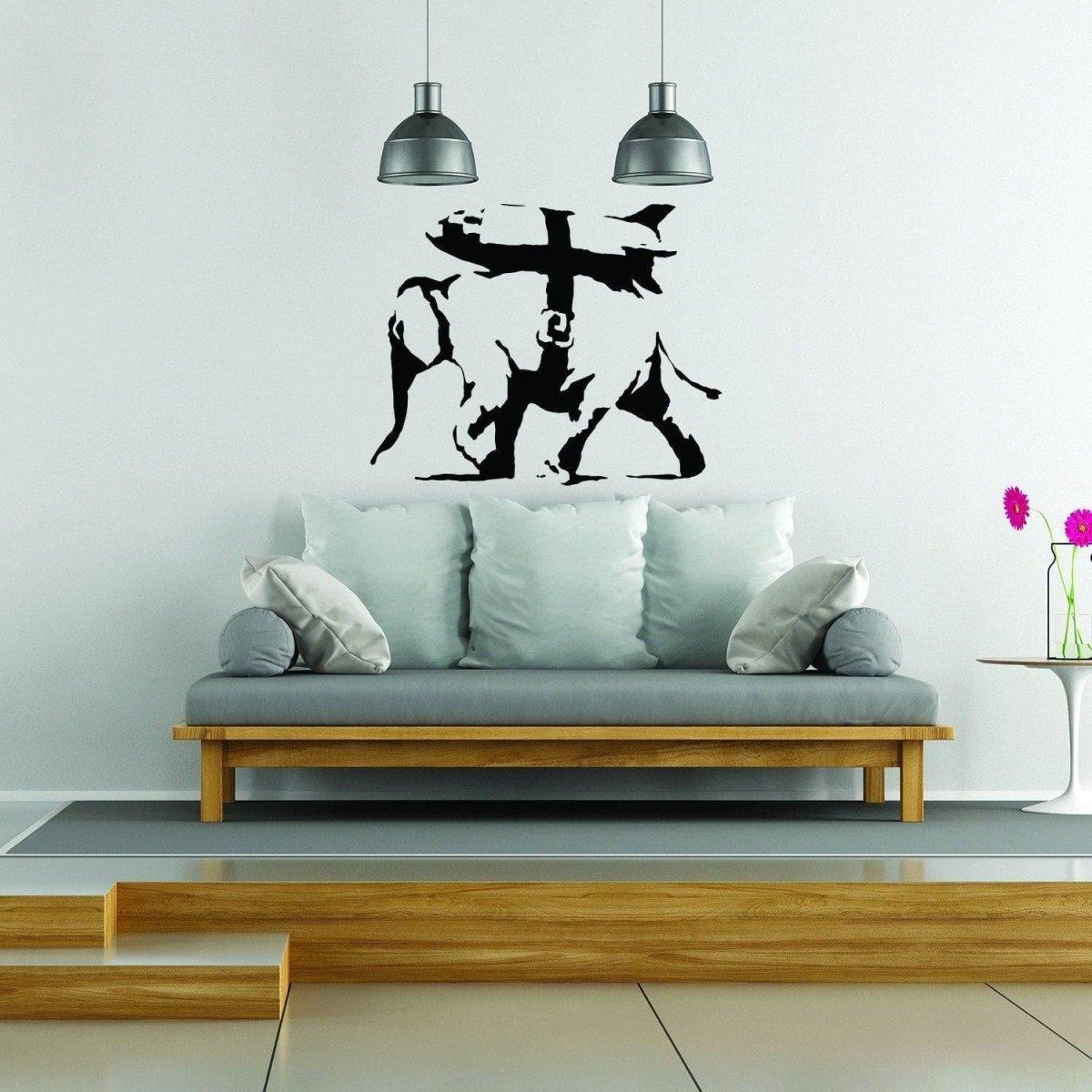 Graffiti-style wall art featuring abstract figures above a stylish couch in a modern living room setting.