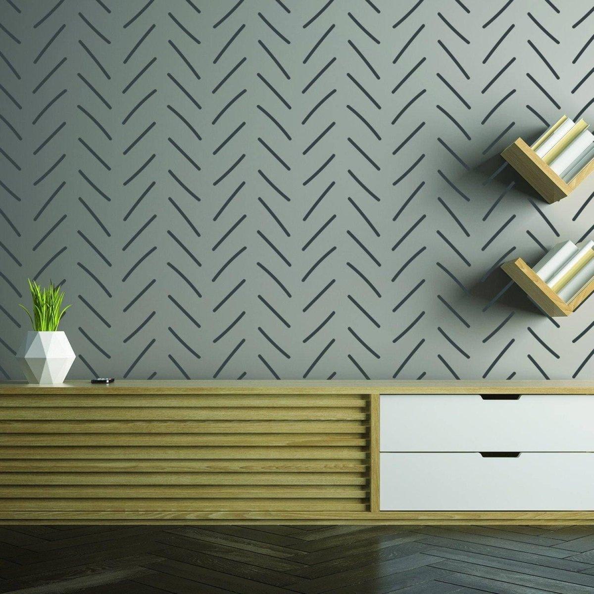 Herringbone peel and stick wall stickers in a modern living room with geometric design and stylish decor.