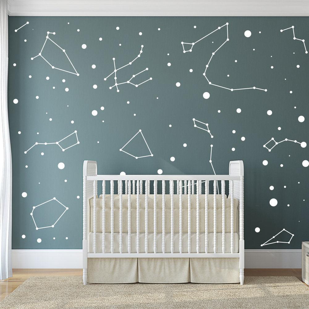 Vinyl wall stickers of constellations on a nursery wall, creating a celestial atmosphere for kids.