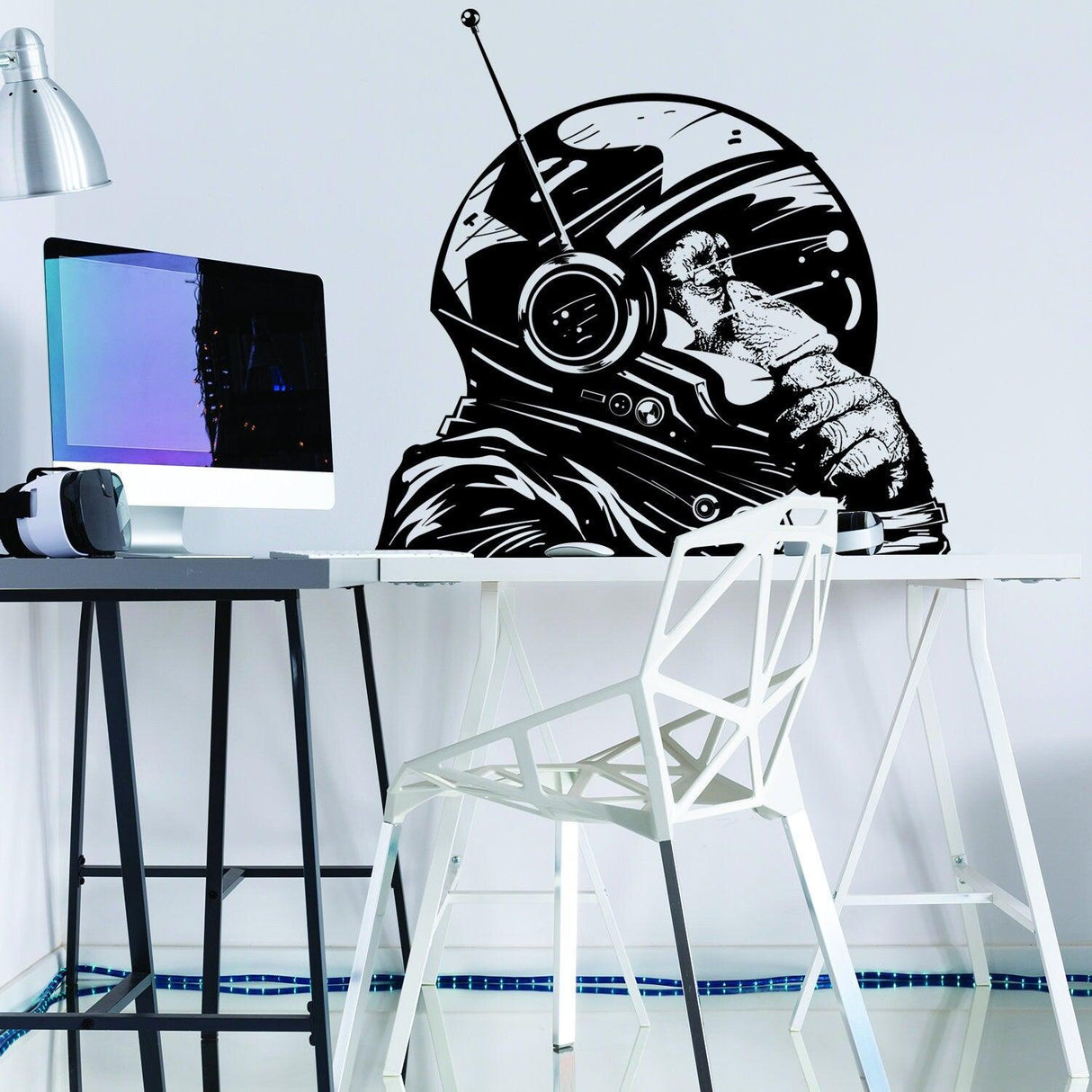 Whimsical Thinking Astronaut Monkey Wall Sticker above a modern desk, featuring intricate astronaut suit details.