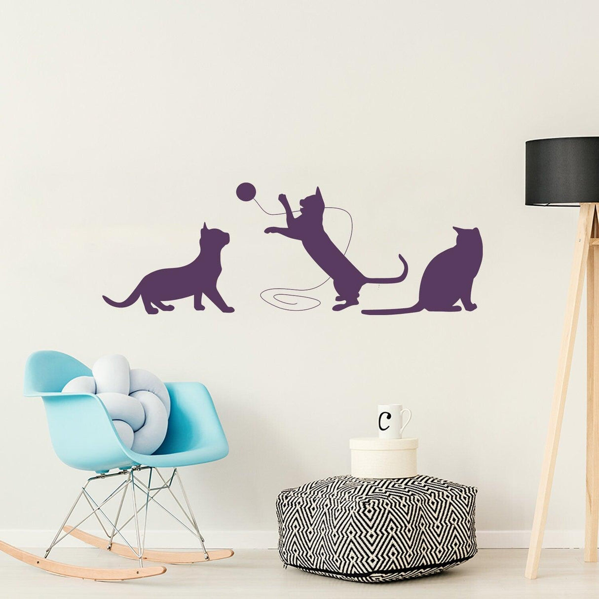 Cute vinyl cat wall decal featuring playful cats in fun poses, perfect for cat lovers' home decor.