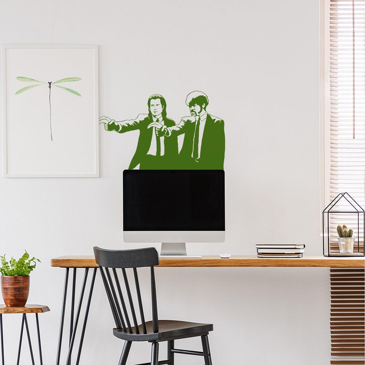 Banksy Pulp Fiction sticker wall art in green, featuring iconic characters against a light decor background.