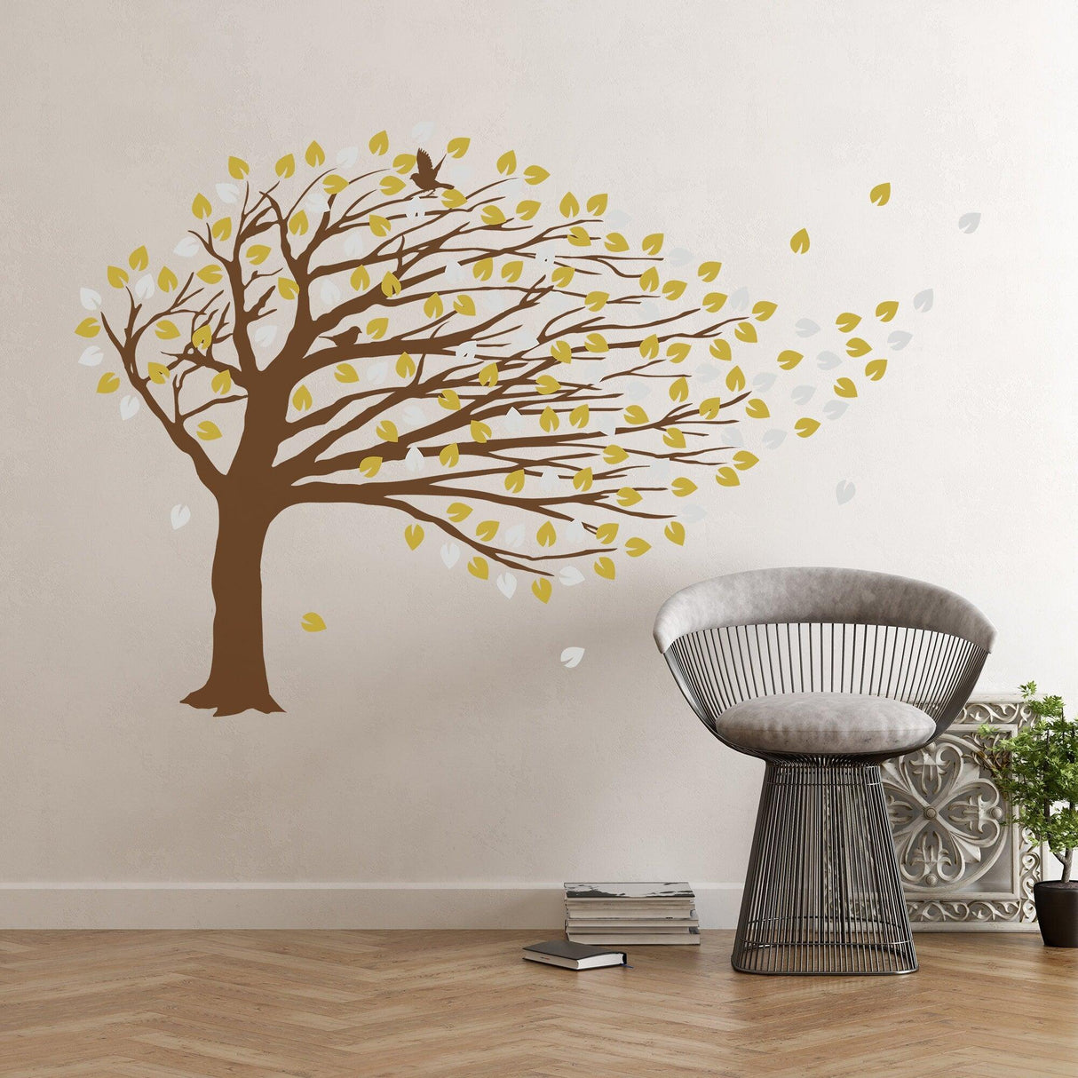 Whimsical brown tree wall decal with swirling branches and colorful leaves for nursery decor.