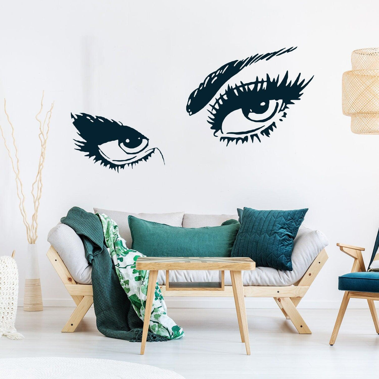Woman eye vinyl wall sticker with long lashes in modern living room decor design.