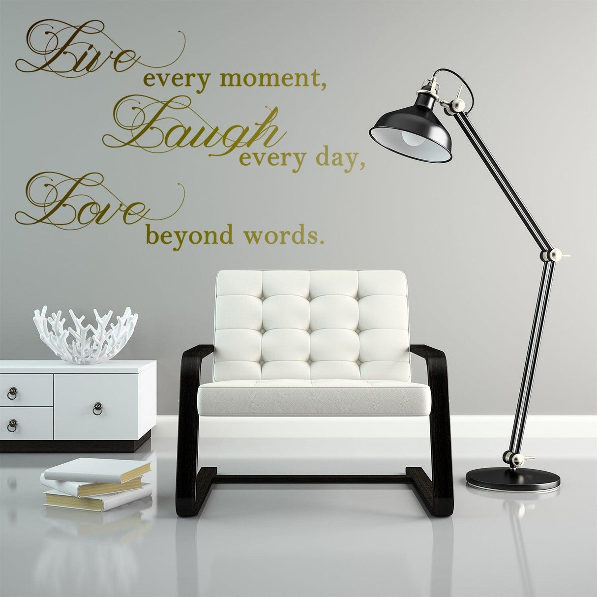 Live Laugh Love wall art quote above a stylish white chair and lamp in a modern room.