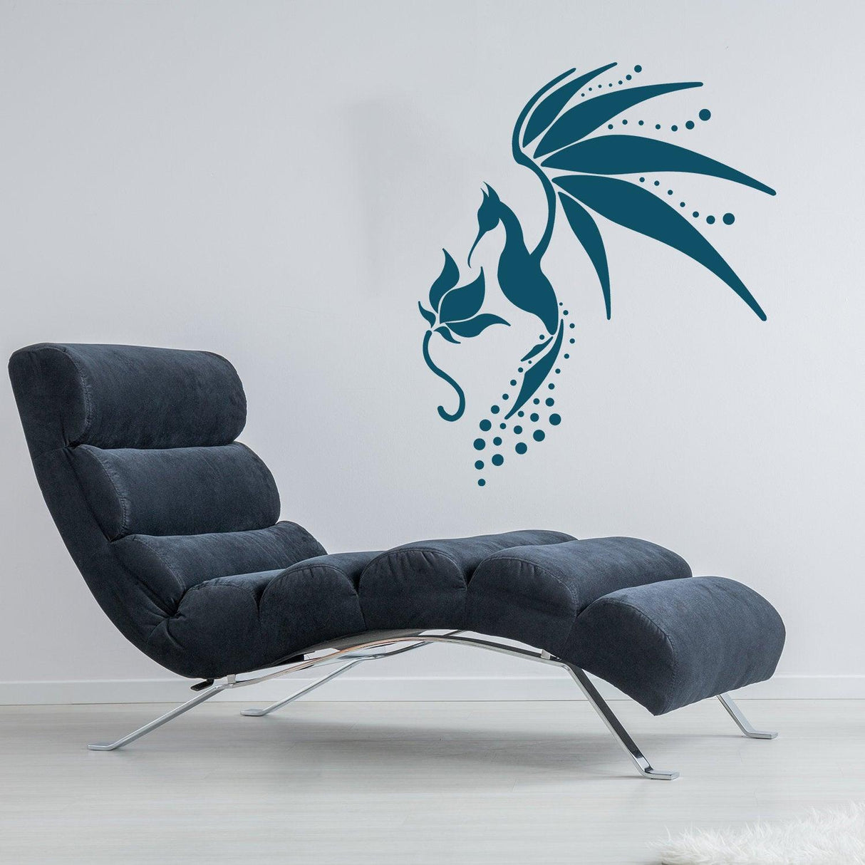 Stylish chair beside a colorful hummingbird wall vinyl sticker, perfect for modern home decor.