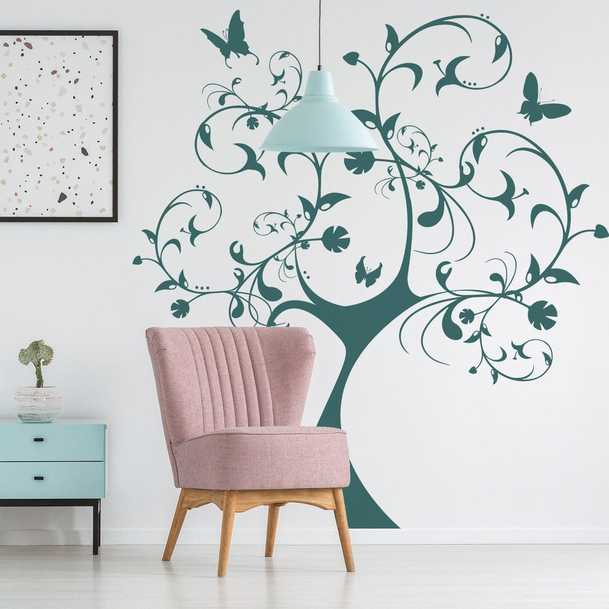 Nursery Tree Wall Art Sticker with botanical design, butterflies, and intricate details in a child's room setting.