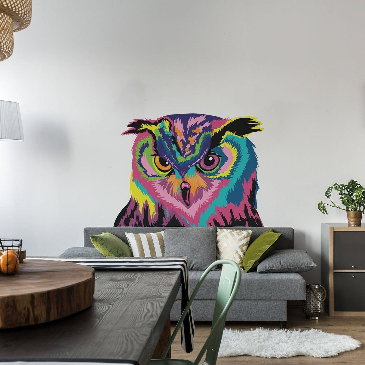 Colorful owl wall sticker design in a living room, adding charm and whimsy to home decor.