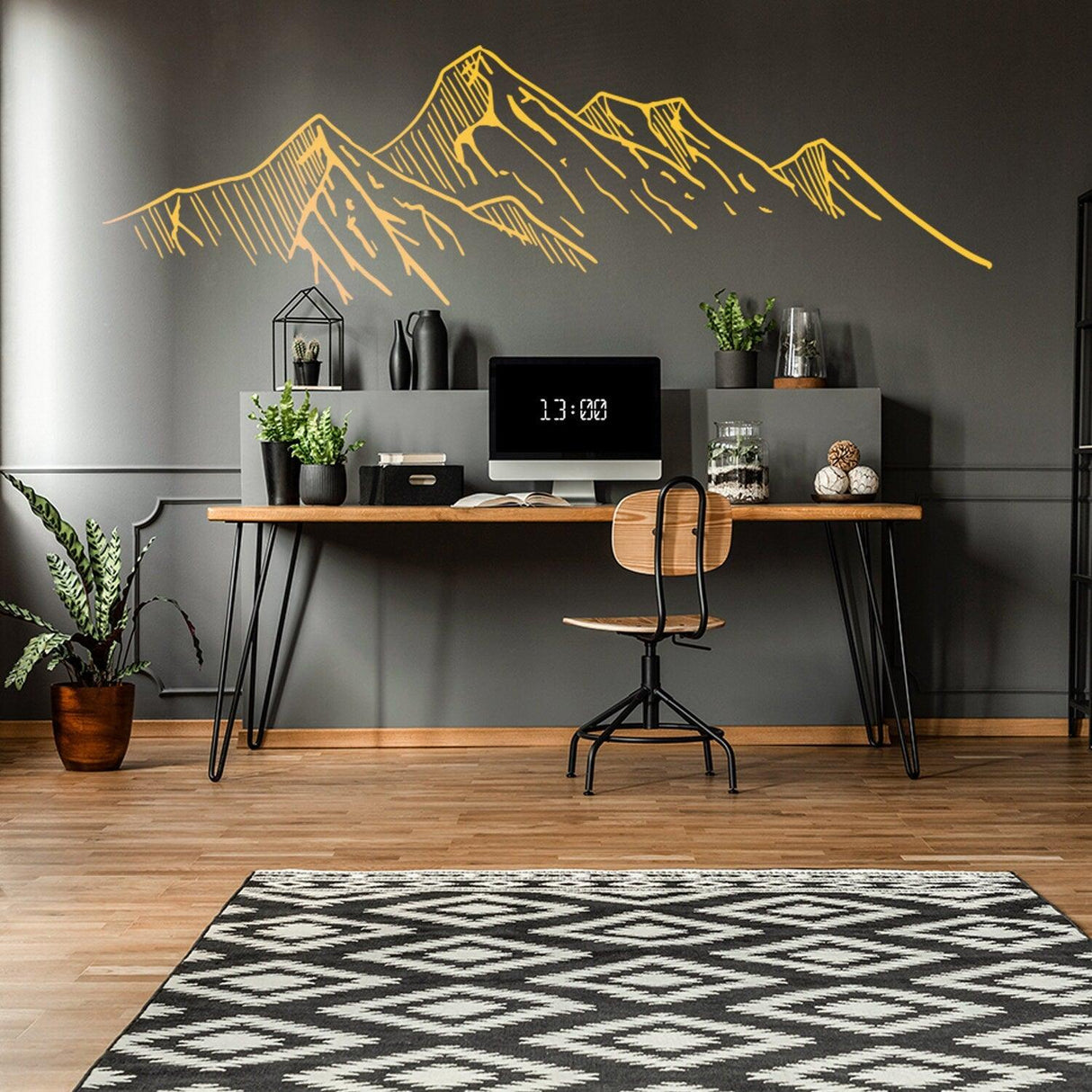 Mountain silhouette wall decal above a desk, adding a nature theme to a modern workspace.