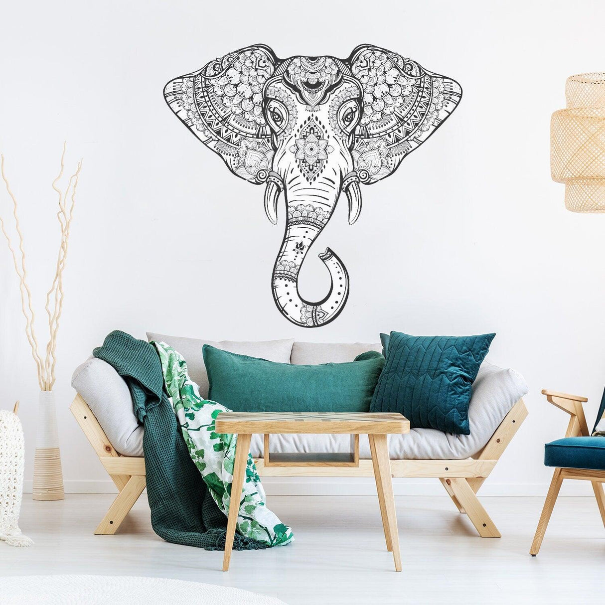 Vinyl wall tribal elephant sticker in living room decor, adding unique touch to home with intricate design.