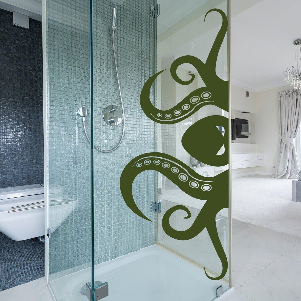 Octopus tentacle vinyl wall art sticker on glass shower wall, adding ocean-themed decor to bathroom.