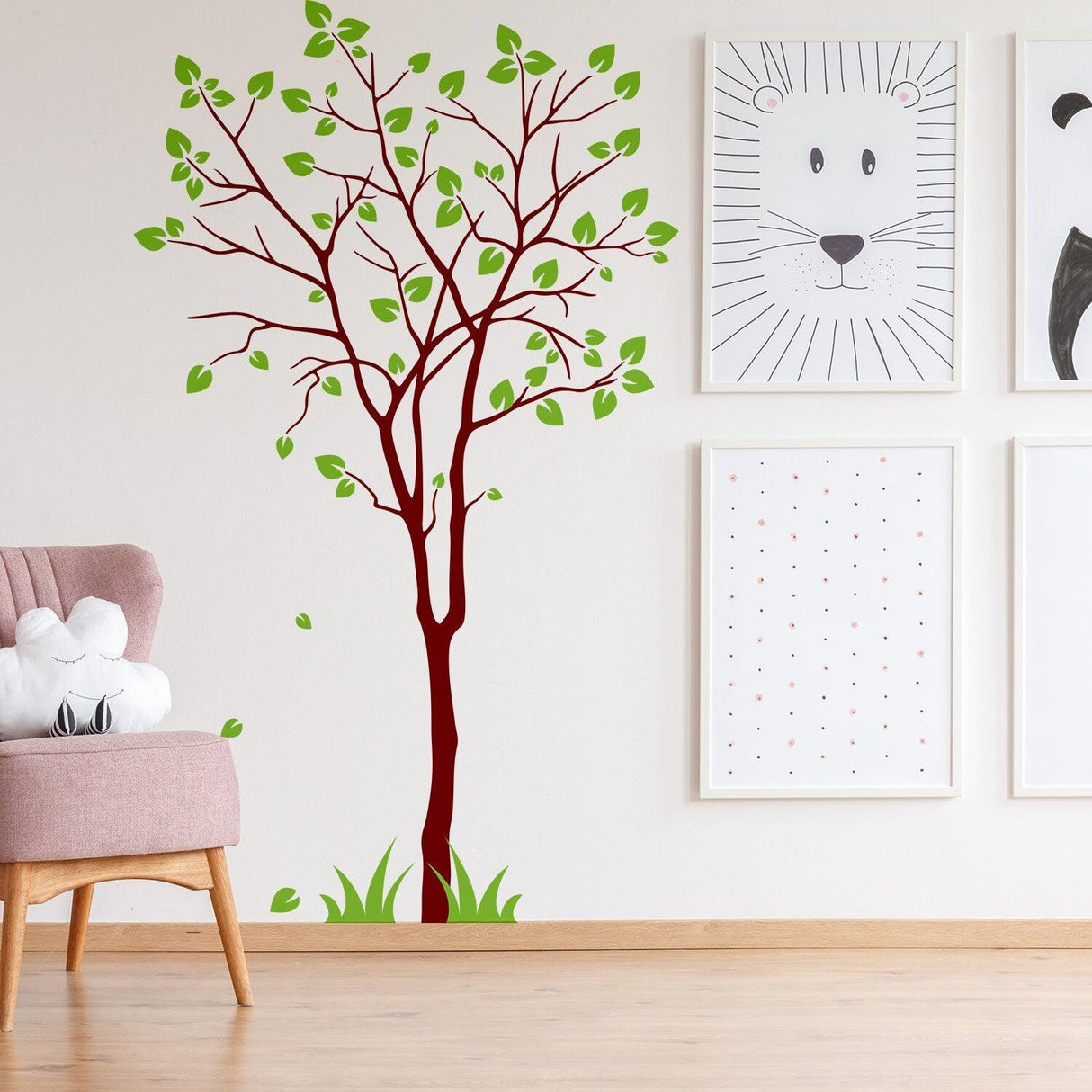Tree sticker decal design featuring a birch tree with green leaves on a nursery wall, adding nature-inspired decor.