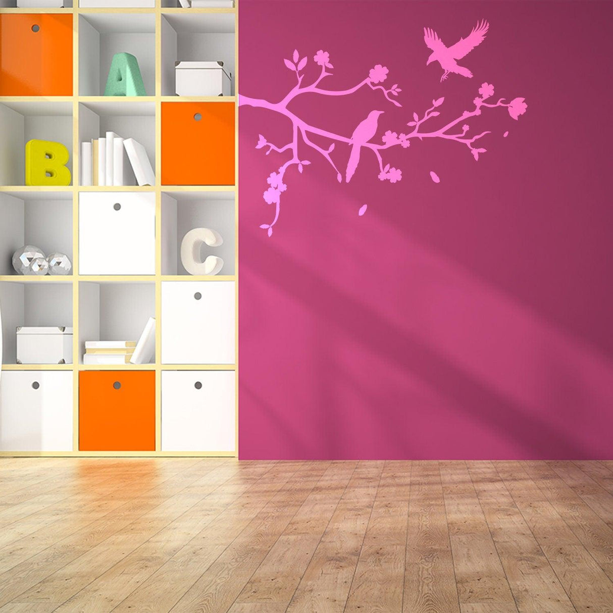 Pink branch wall tree sticker decal with birds in a colorful kids room decor.