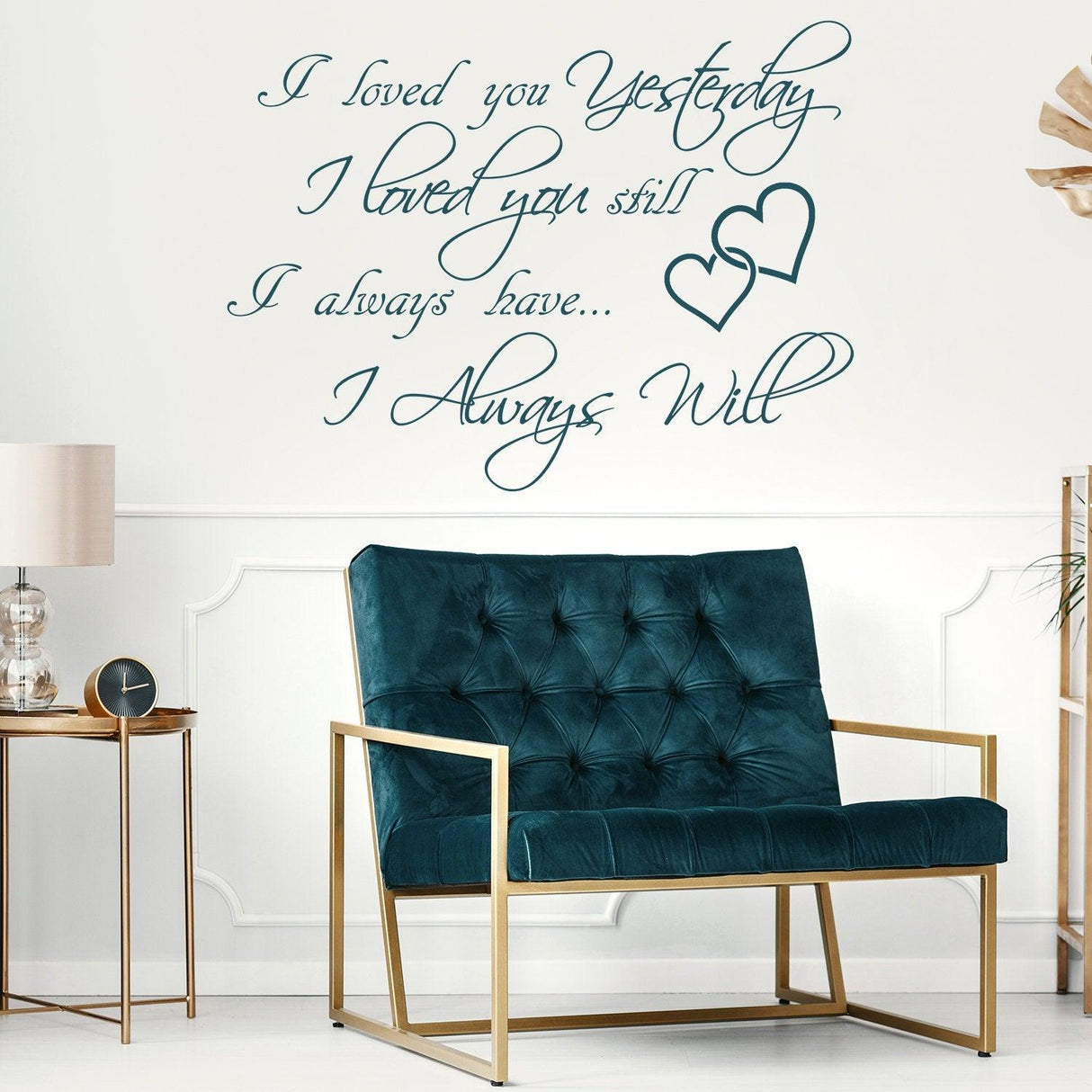 I Love You Yesterday wall sticker in cursive font above a modern teal chair, perfect for expressing love in home decor.