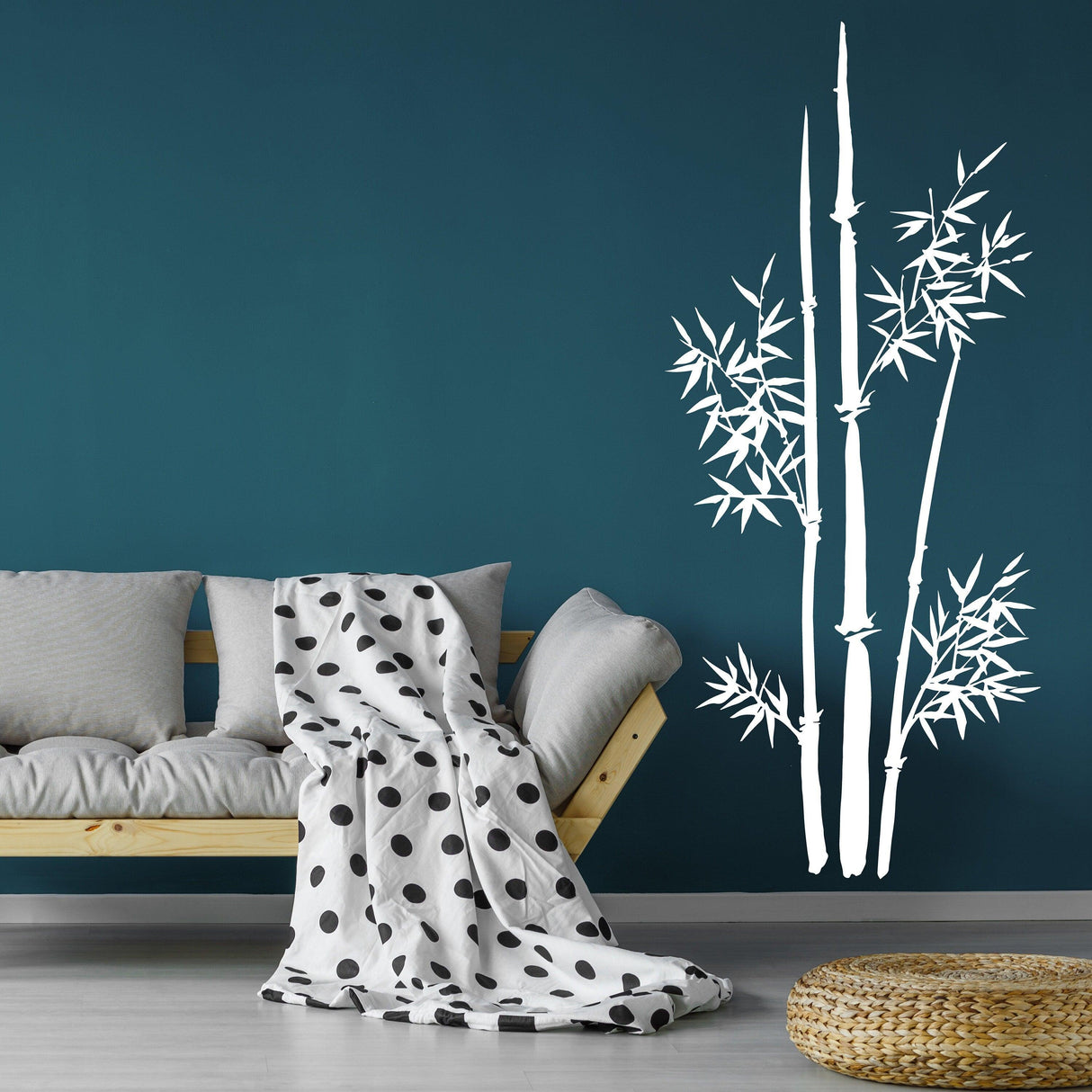 Bamboo wall vinyl sticker decor design with stalks on a blue wall, enhancing home interior aesthetics.