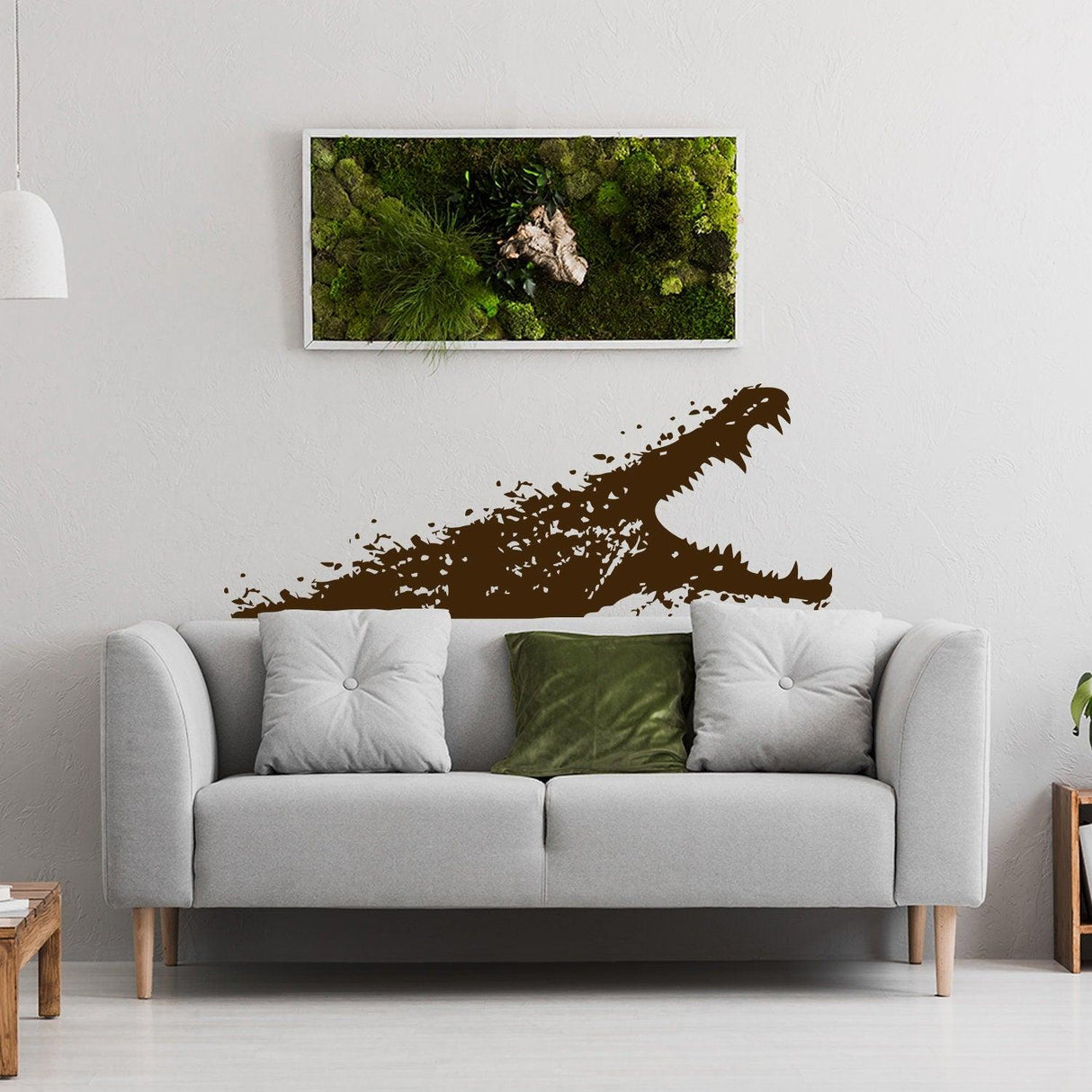 Aligator wall sticker above a cozy sofa in a stylish living room, adding a whimsical touch to the decor.