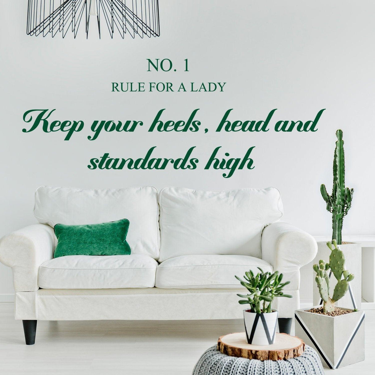 Rule for a Lady wall sticker with motivational quote in stylish font on a modern living room wall.