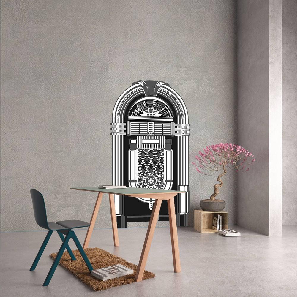Vintage jukebox wall decor sticker in a modern room setting with a table and chair.