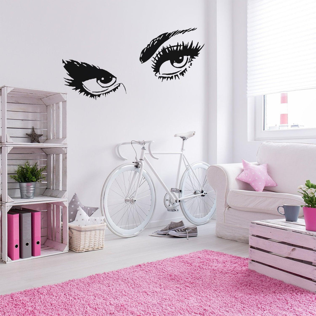 Elegant vinyl wall sticker of woman's eyes with long lashes, perfect for beauty salons or chic home decor.
