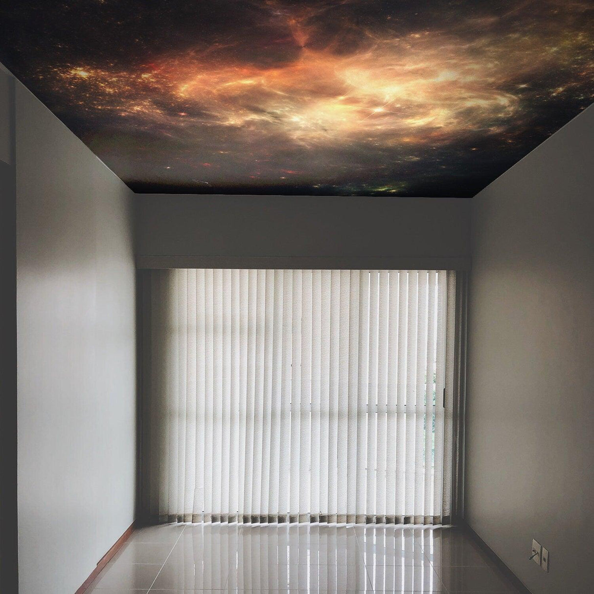 Space theme ceiling vinyl sticker with a galaxy design creating a dreamy atmosphere in a room.