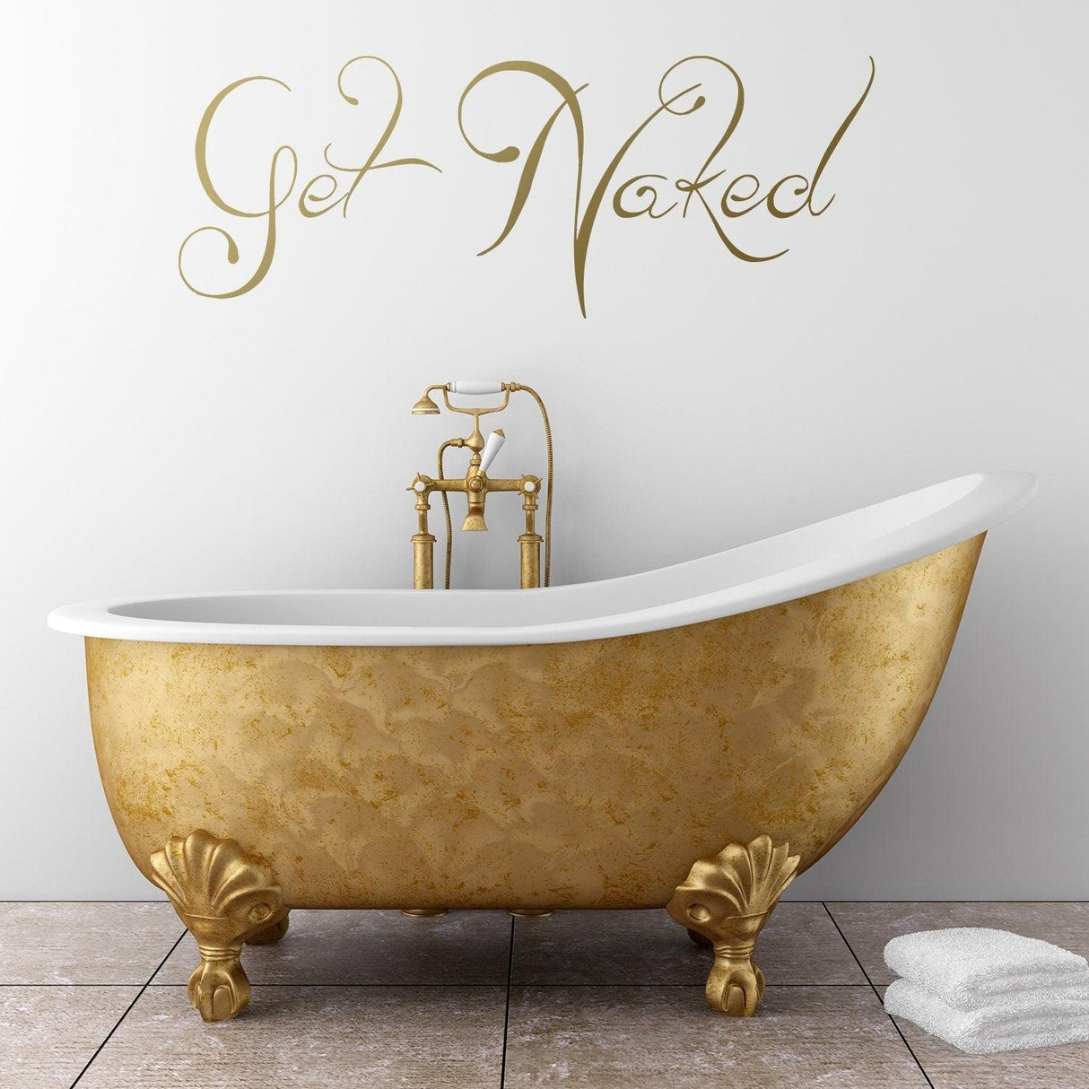 Get Naked wall sticker above a stylish gold bathtub in a modern bathroom setting.