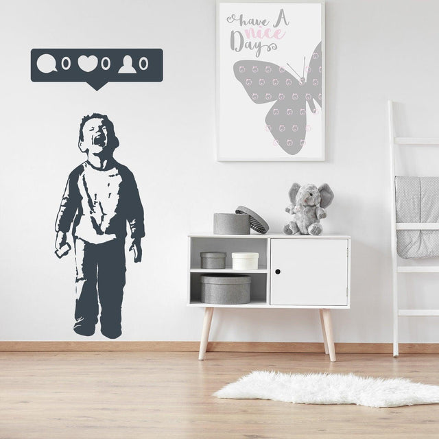 Crying Boy With Cellphone Banksy Wall Sticker depicting social media symbols, ideal for room décor.