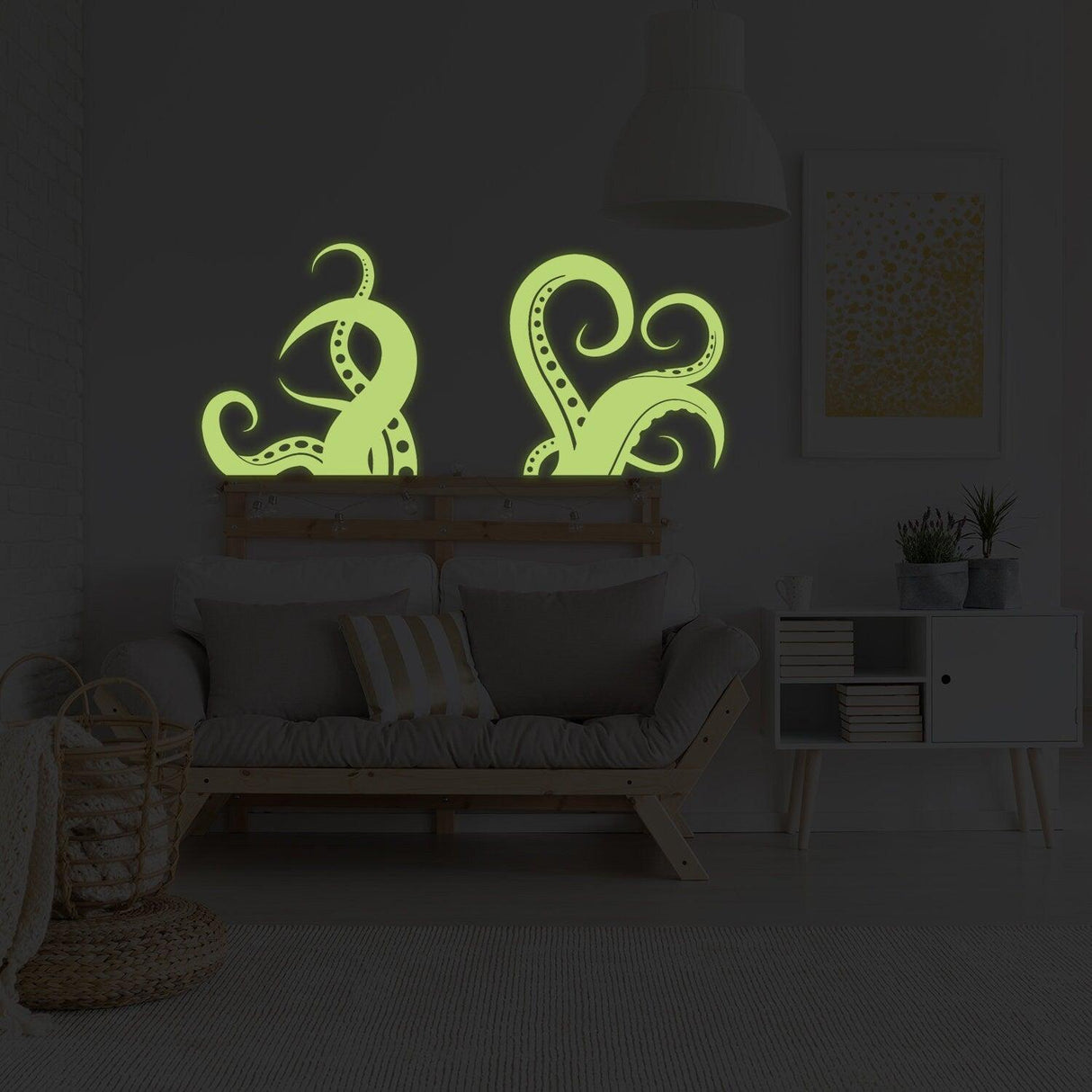 Glow in dark octopus tentacle vinyl wall art sticker in a cozy living room setting