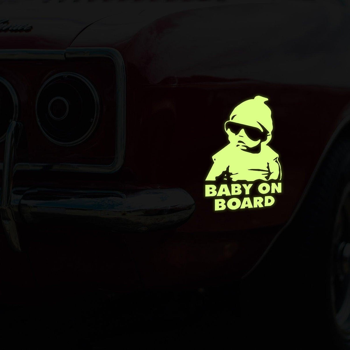 Glow in dark baby on board vinyl sticker on car, humorous safety decal for parents with kids.