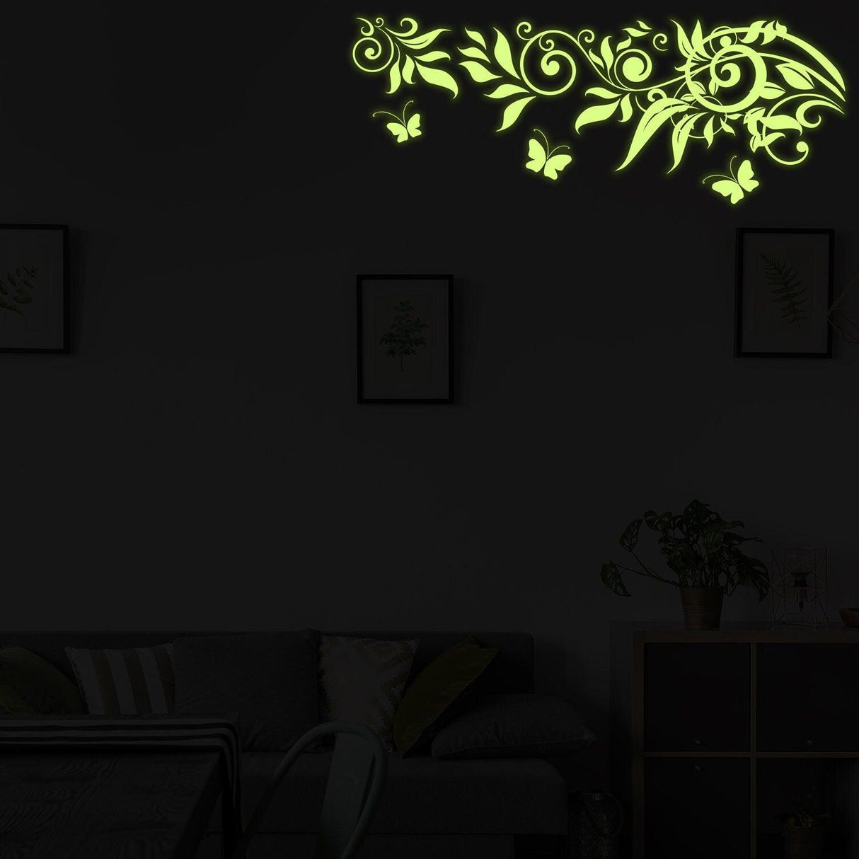 Glow At Night decal showcasing glowing vine and butterfly design on a dark wall, adding a magical touch to any room.
