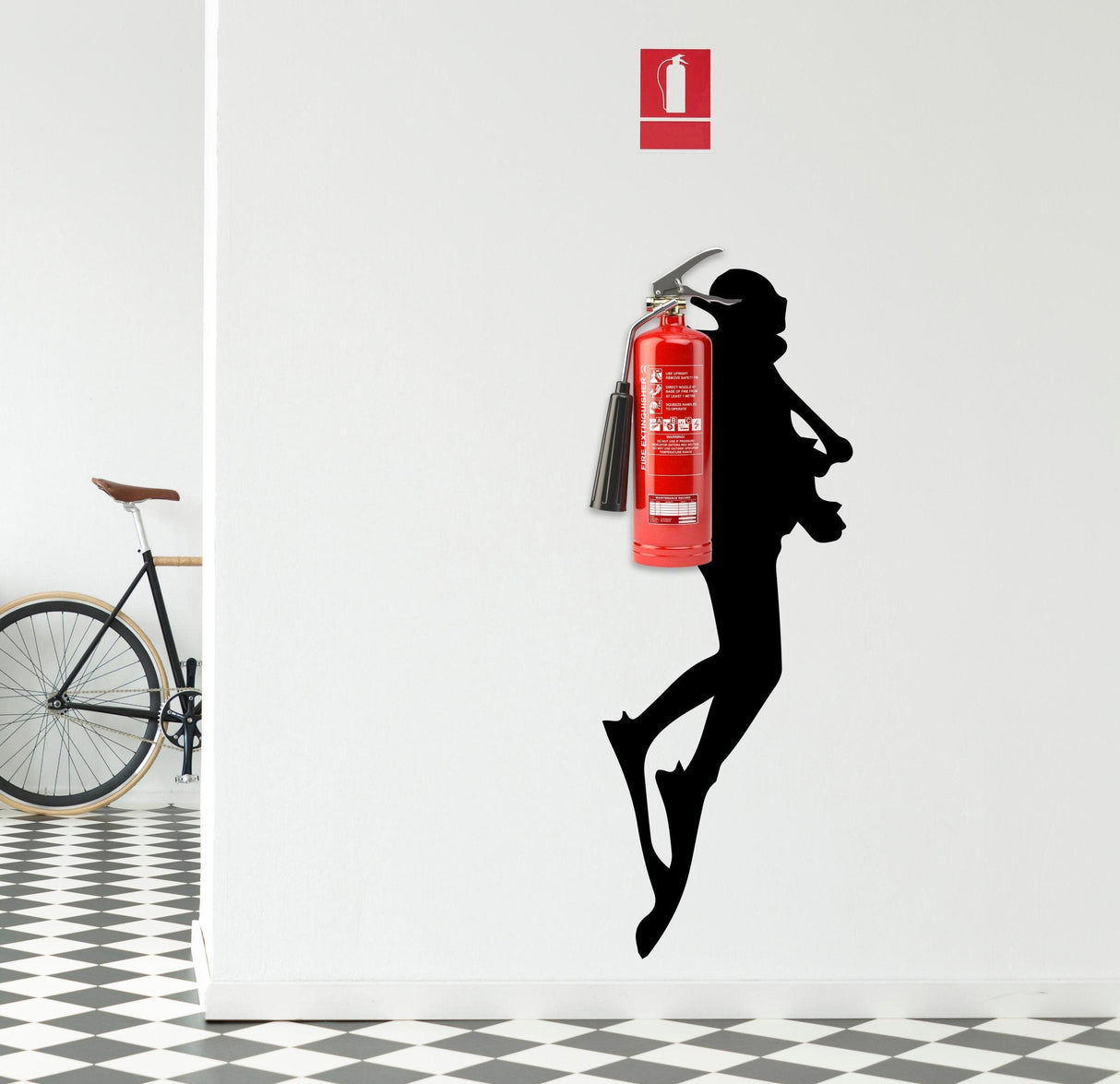 Scuba diver wall sticker silhouette with fire extinguisher decor in modern interior setting.