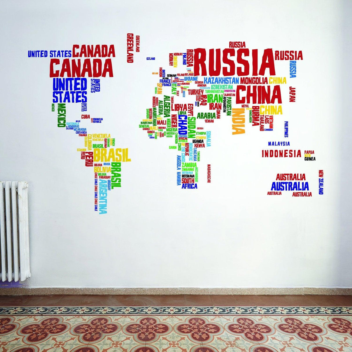 Colorful world map vinyl wall sticker featuring country names in artistic fonts, ideal for kids' rooms or classrooms.