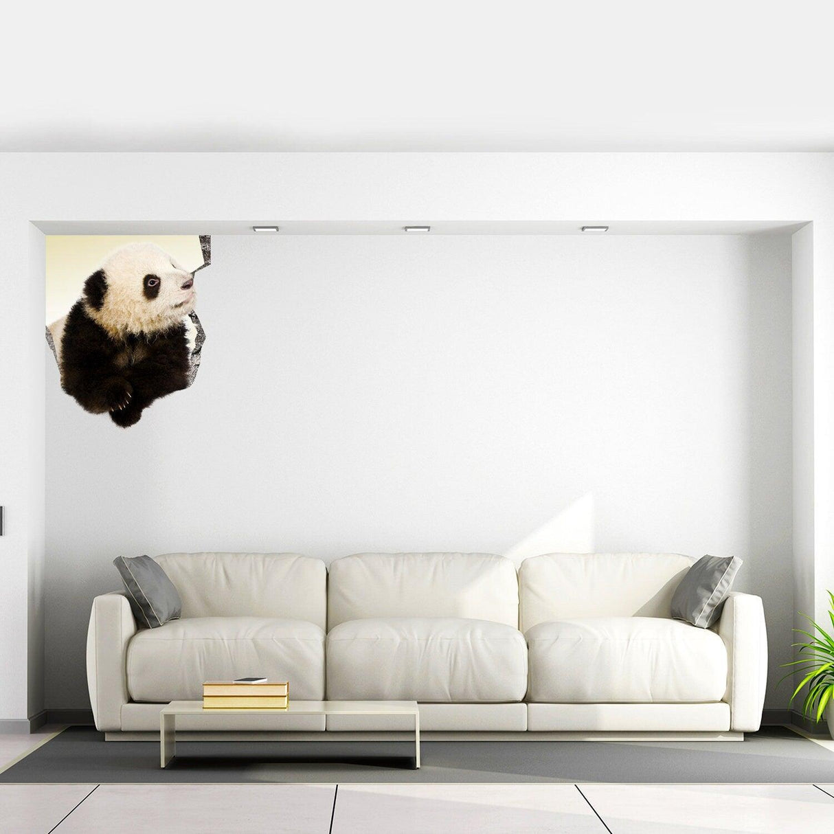 3D Art Animal Hole In Wall Sticker featuring a panda breaking through a white wall above a modern sofa.