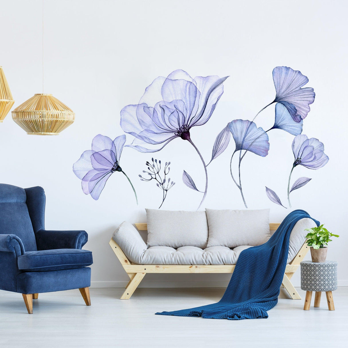3D floral wall mural featuring blue flowers in a modern living room with a blue sofa and cozy decor.