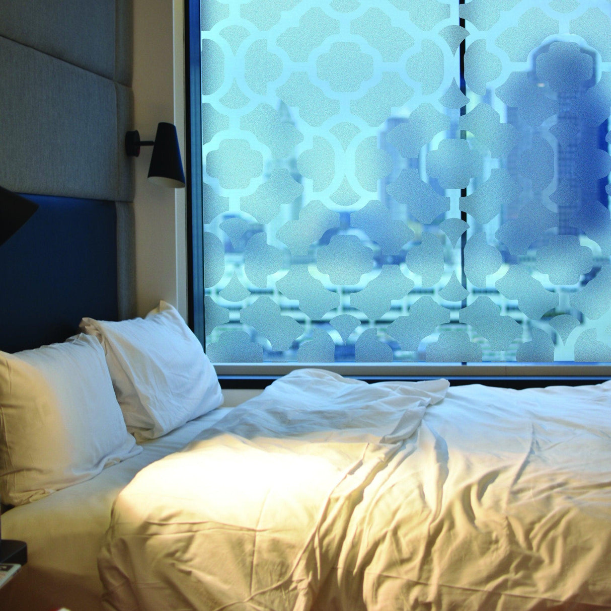 Frosted door film privacy vinyl decal on a bedroom window, enhancing privacy and style with an elegant etched glass design.