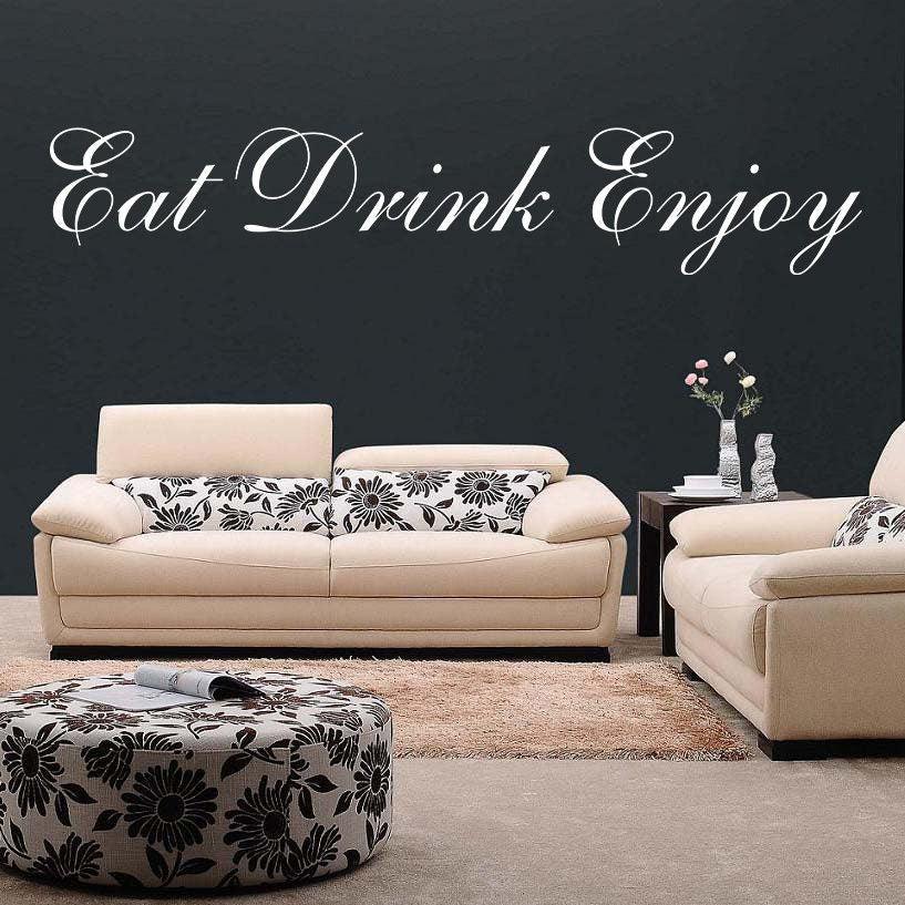 Stylish vinyl wall sticker 'Eat Drink Enjoy' in a modern kitchen with beige furniture and floral accents.