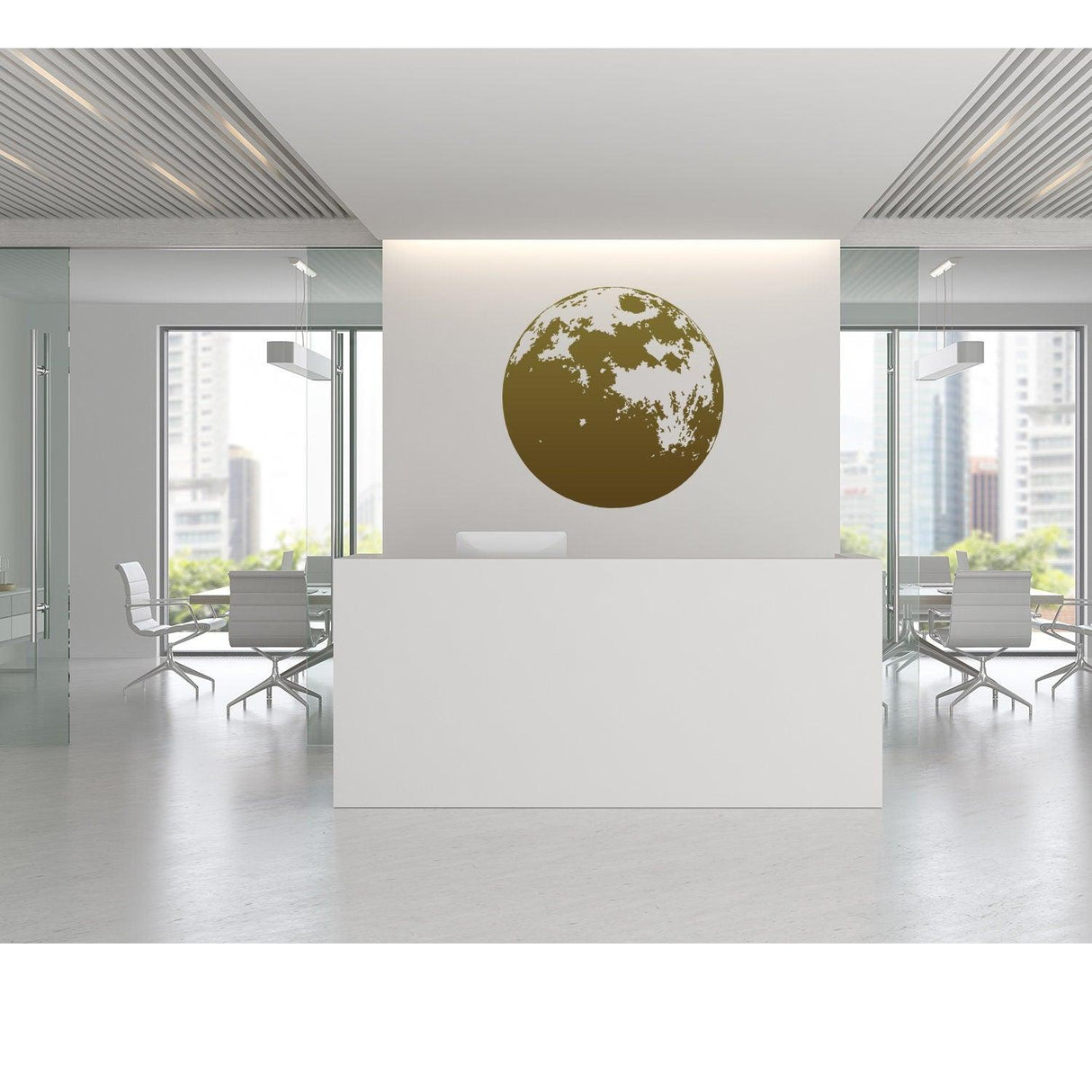 Modern office reception area featuring a large brown moon wall decal above the front desk.