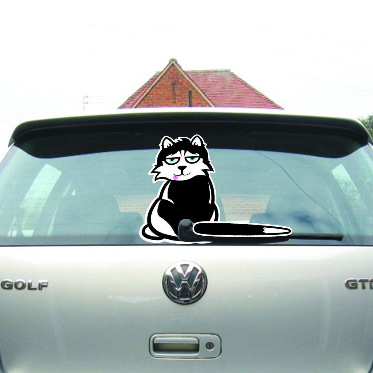 Cute cartoon cat decal on a car's rear windshield, adding personality to any vehicle.