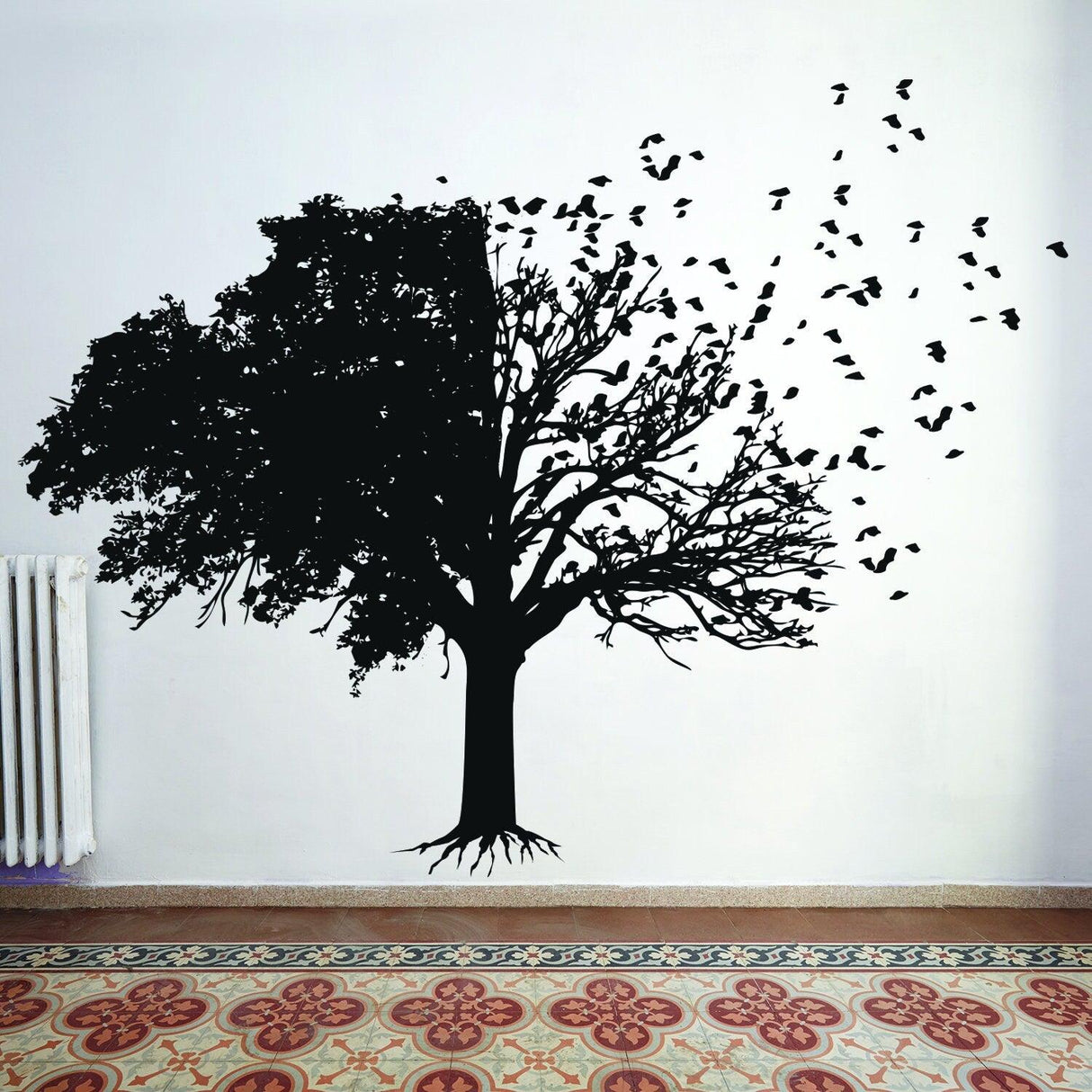 Black tree wall decal with leaves and birds for elegant home decor in living room or bedroom.