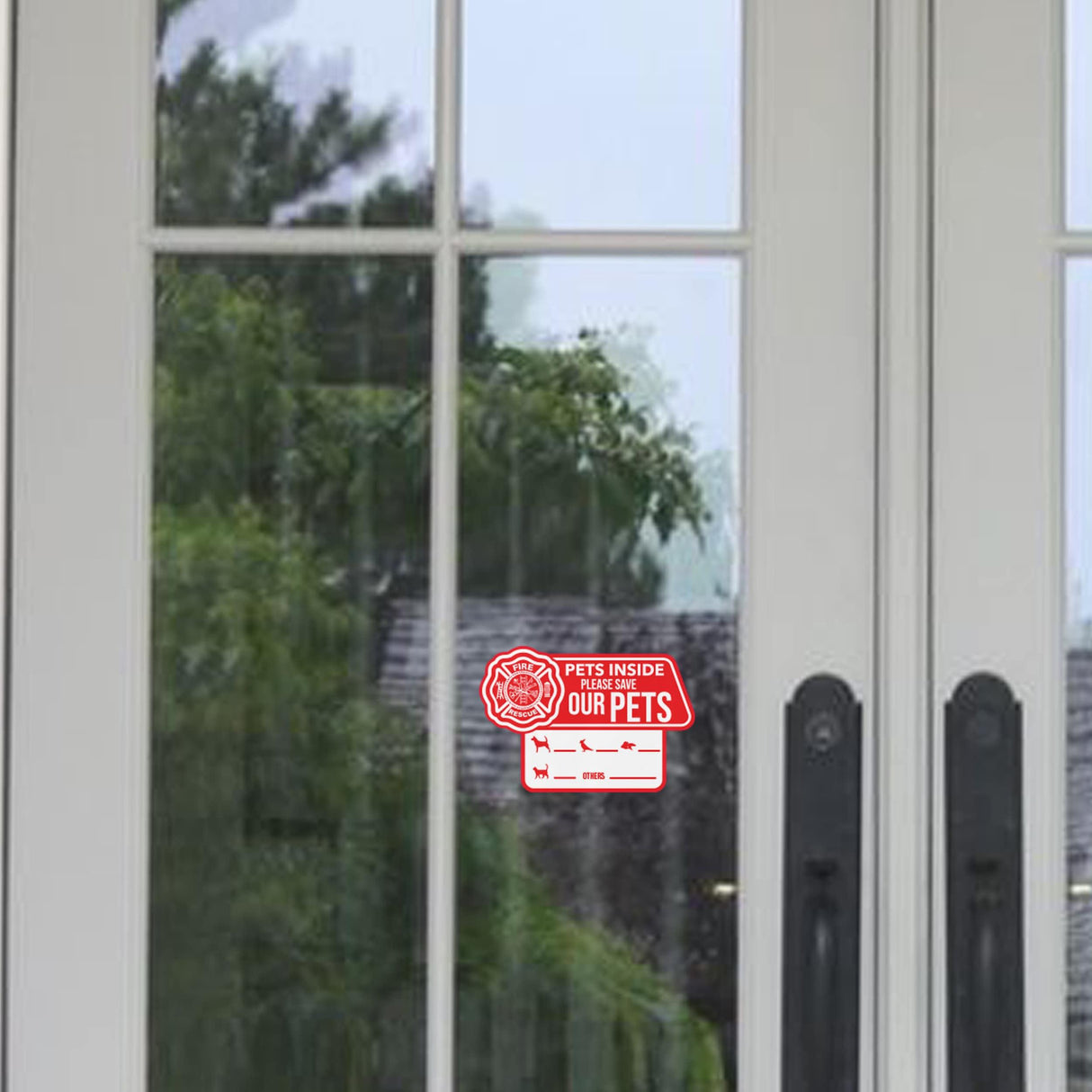 Emergency cling sticker on glass door indicating pets inside for safety.