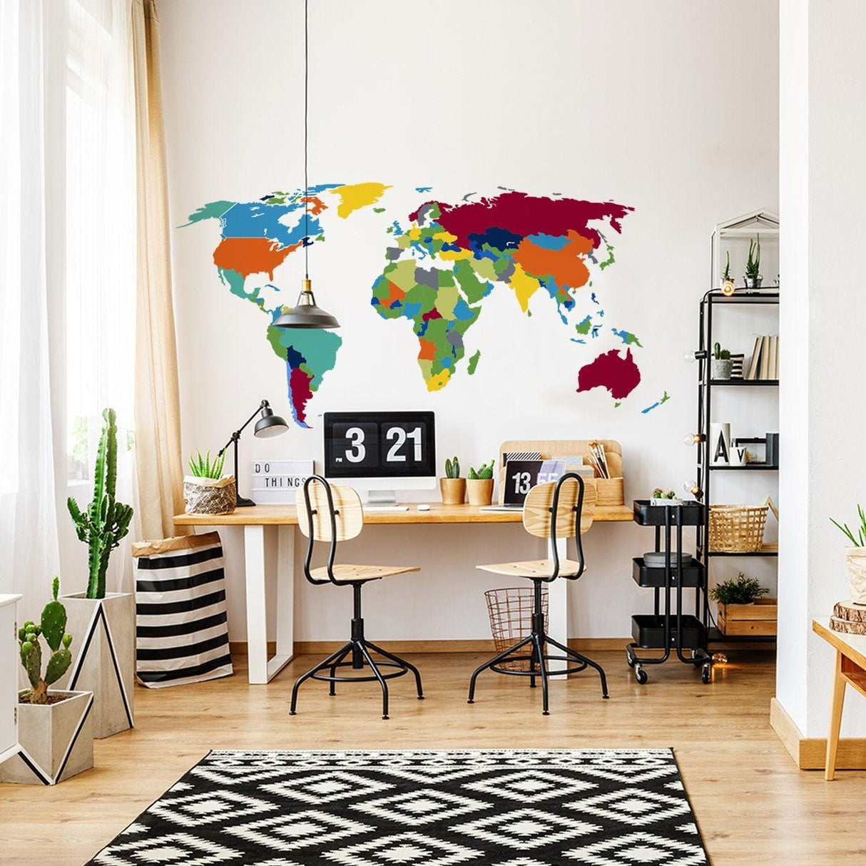 Colorful large world map wall decal in a chic office space, perfect for boys room or playroom decor.