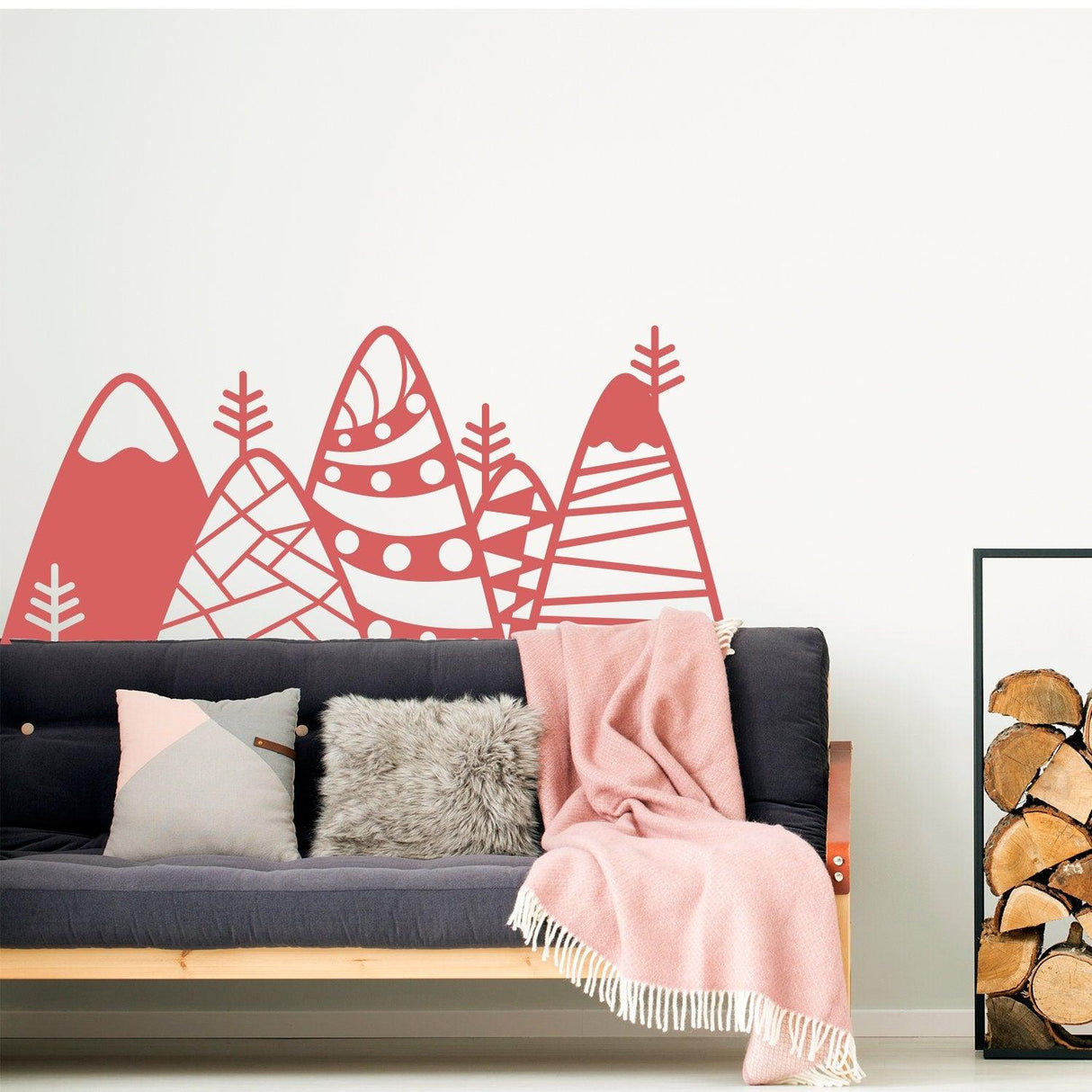 Patterned mountain wall decor decal in a kid's room, featuring playful designs in red on white wall.