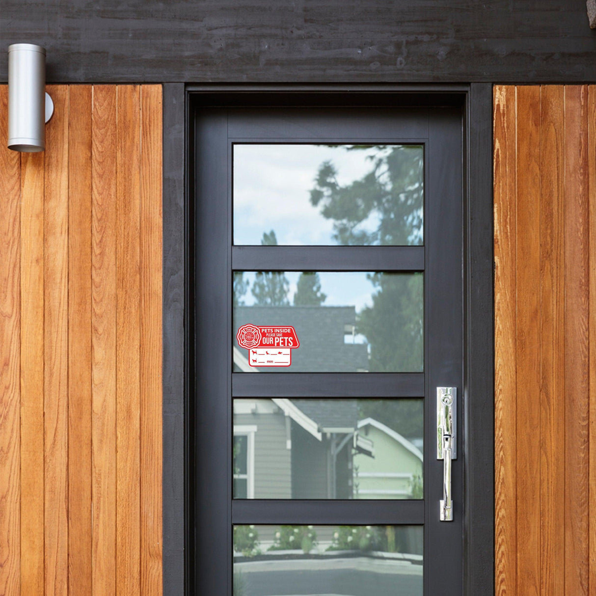 Front door with a Pet Alert Emergency Cling Sticker indicating pets inside for emergency responders.