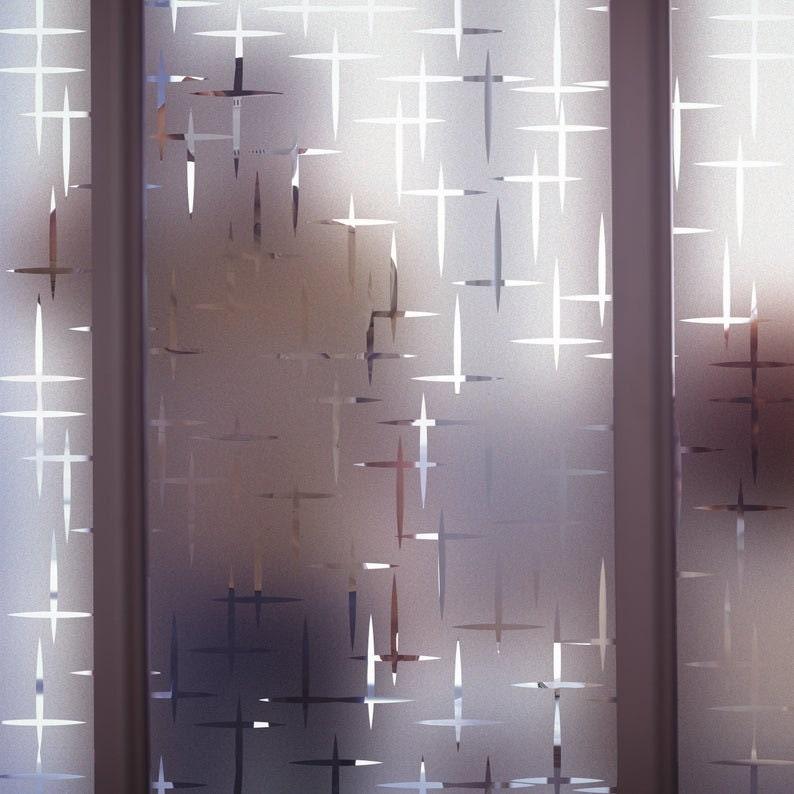 Custom frosted vinyl sticker with a matte etched design, enhancing privacy on glass surfaces.
