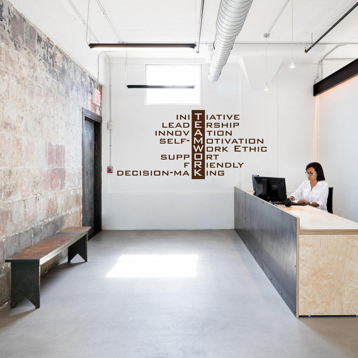 Teamwork wall sticker with motivational words in modern office setting, inspiring collaboration and productivity.