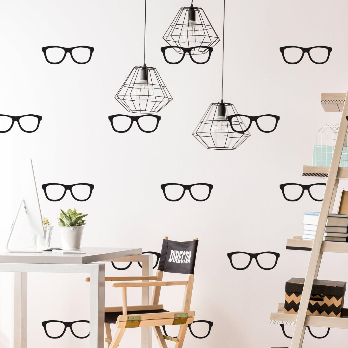 Stylish glasses wall decals in a modern room with hanging lights and a minimalist chair.