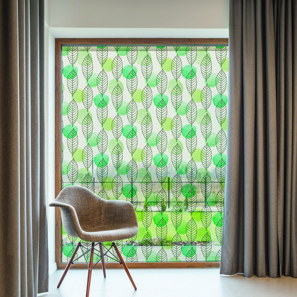 Leaf window privacy glass film with an elegant design, enhancing room decor and providing privacy.